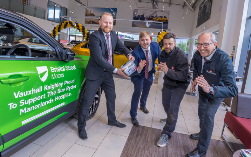 Motor Dealership Colleagues Get A Coating Of Many Colours In The Name Of Charity
