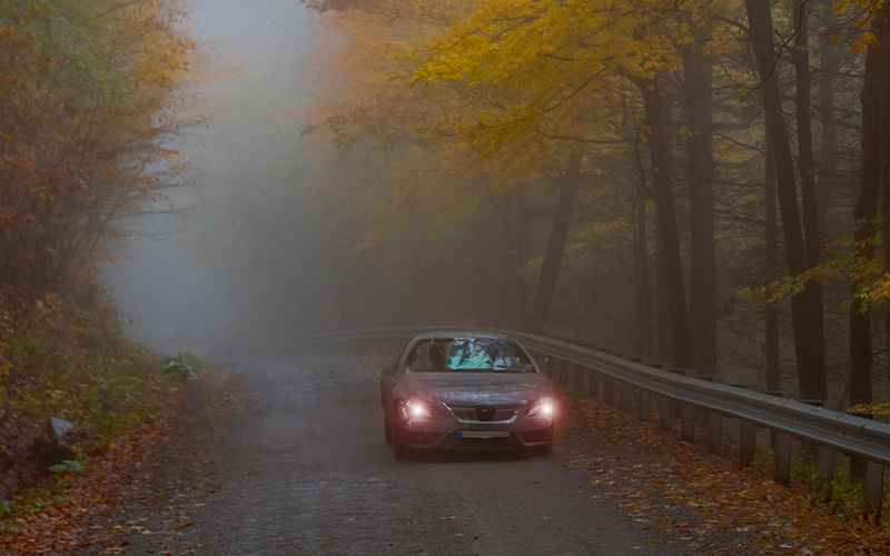 Driving in mist in autumn
